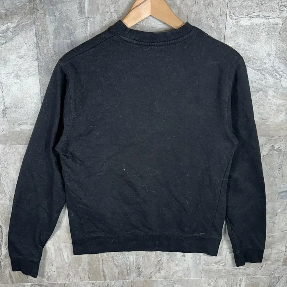 Black crewneck sweatshirt with yellow SET IT OFF flaming jack-o'-lantern size S